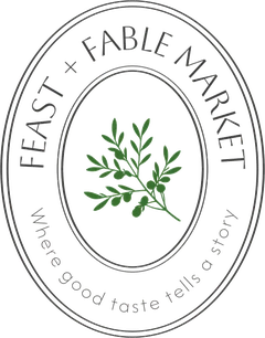 Feast + Fable Market logo with olive branch
